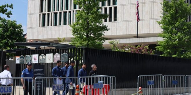 Iran's national football team players and members of their delegation leave the US Embassy in Ankara after submitting their visa applications ahead of the 2026 FIFA World Cup, on May 21, 2026. The Iranian football federation vice-president said on May 20, 2026 he was "very confident" in FIFA's protocols as the team prepare to play at the World Cup in the United States. The players are to stay several weeks before heading to the World Cup that is being co-hosted by the US, which began bombing Iran on February 28 alongside Israel, sparking a wider war in the Middle East. (Photo by Adem ALTAN / AFP)